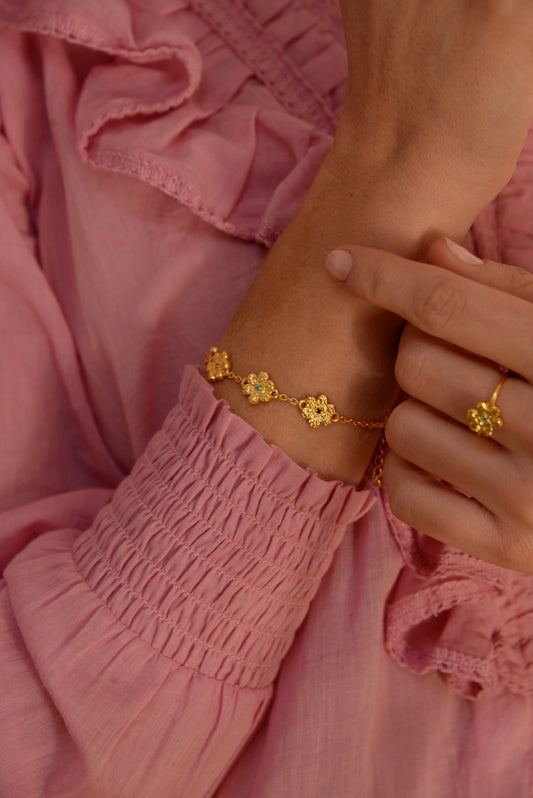 GOLD HAMMERED FLOWER BRACELET