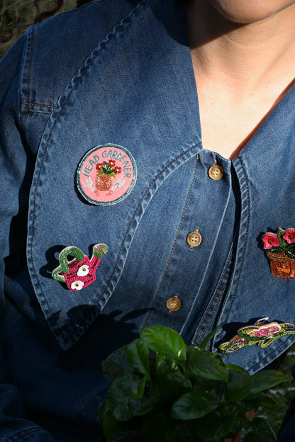 HEAD GARDENER ON PINK BROOCH