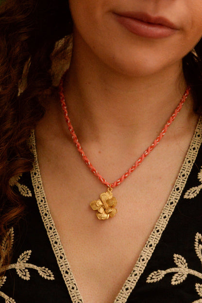 STATEMENT GOLD FLOWER NECKLACE ON PEACH CORD