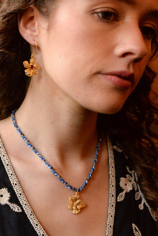 STATEMENT GOLD FLOWER NECKLACE ON BLUE CORD