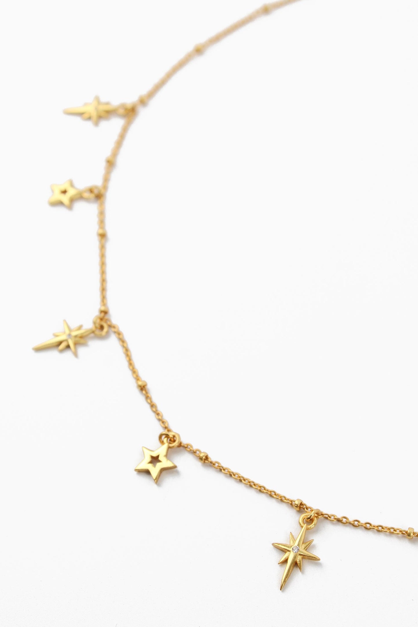 GOLD STAR CHARM NECKLACE