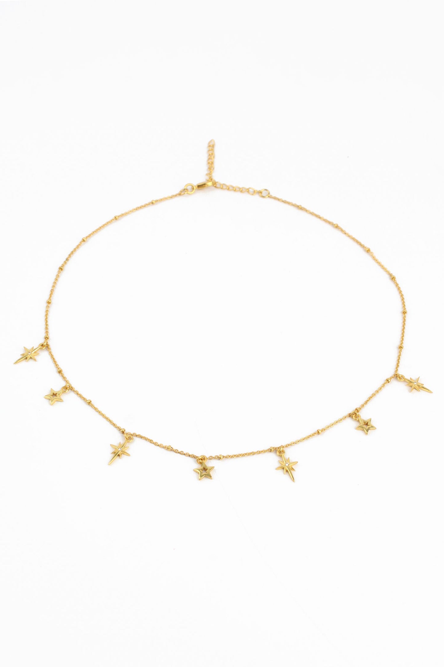 GOLD STAR CHARM NECKLACE