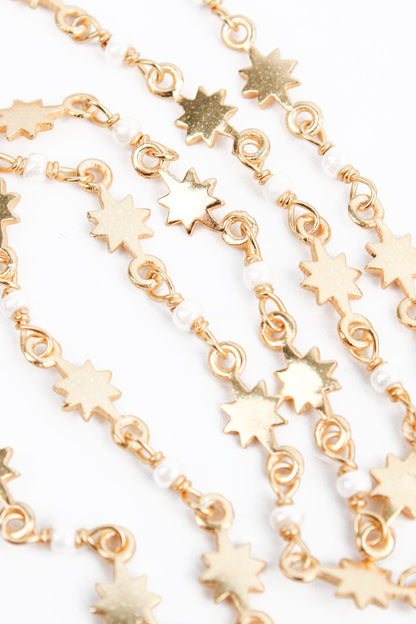 GOLD STAR NECKLACE WITH PEARL BEADS