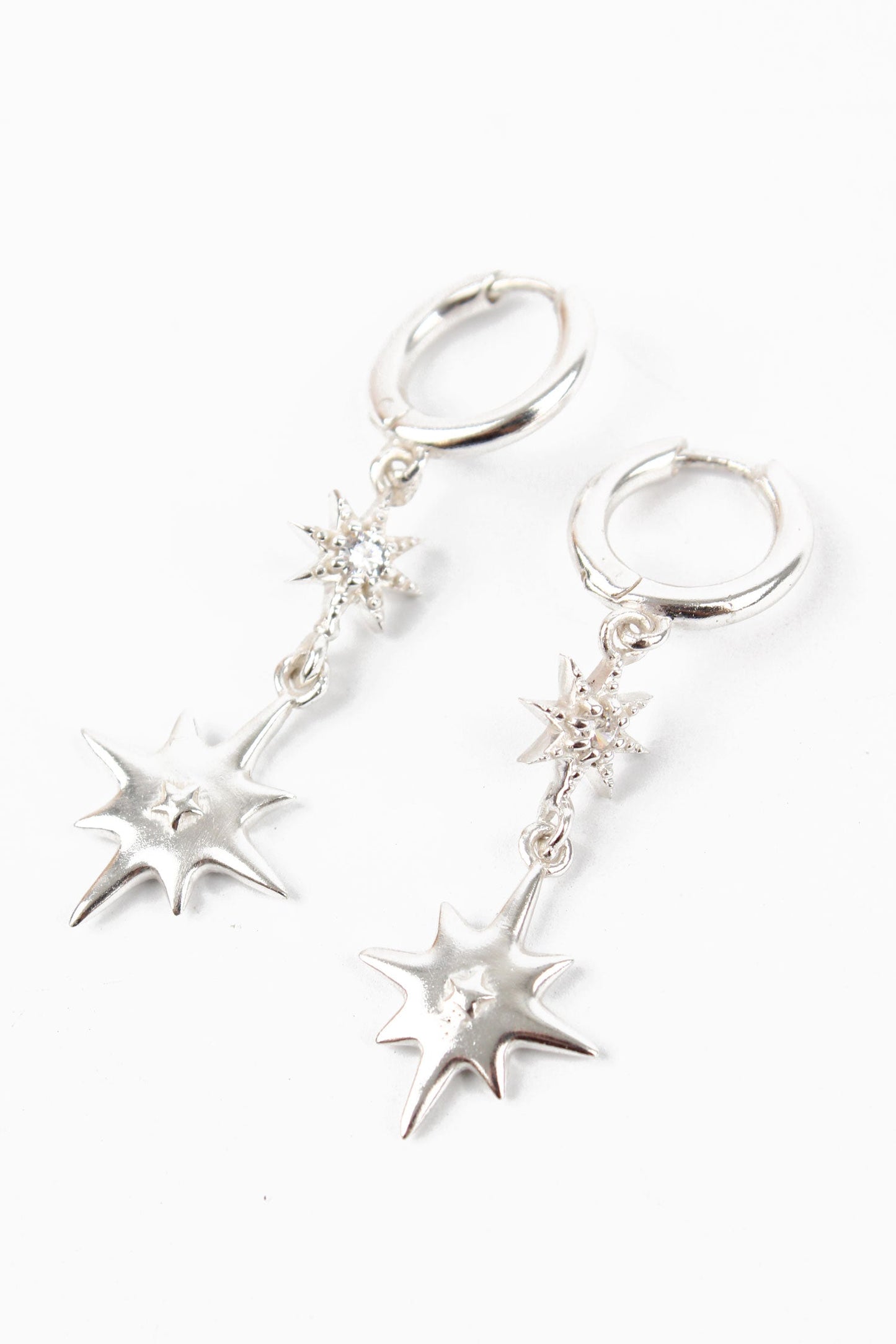 SILVER DOUBLE STAR HUGGIE HOOP EARRING